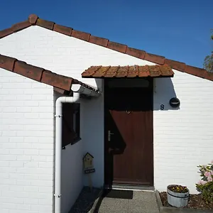 Strandjutter Huisje 8 Ferienhaus